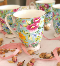 Load image into Gallery viewer, Turquoise mug with flowers
