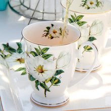 Load image into Gallery viewer, Mug with white flowers
